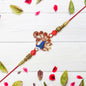 Ethnic Peacock Rakhi With Stone Detailing