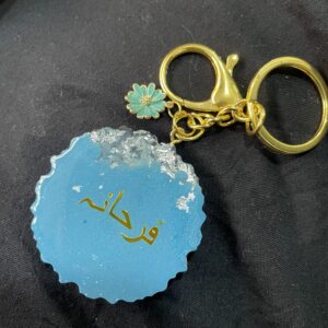 Resin aytul kursi keychain with name on it